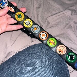 Little Earth bottle cap/seatbelt belt